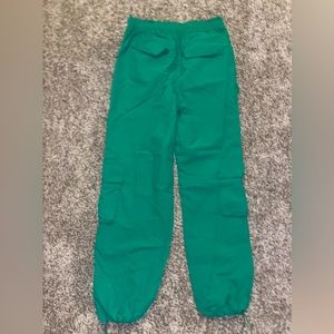 Green women’s parachute pants